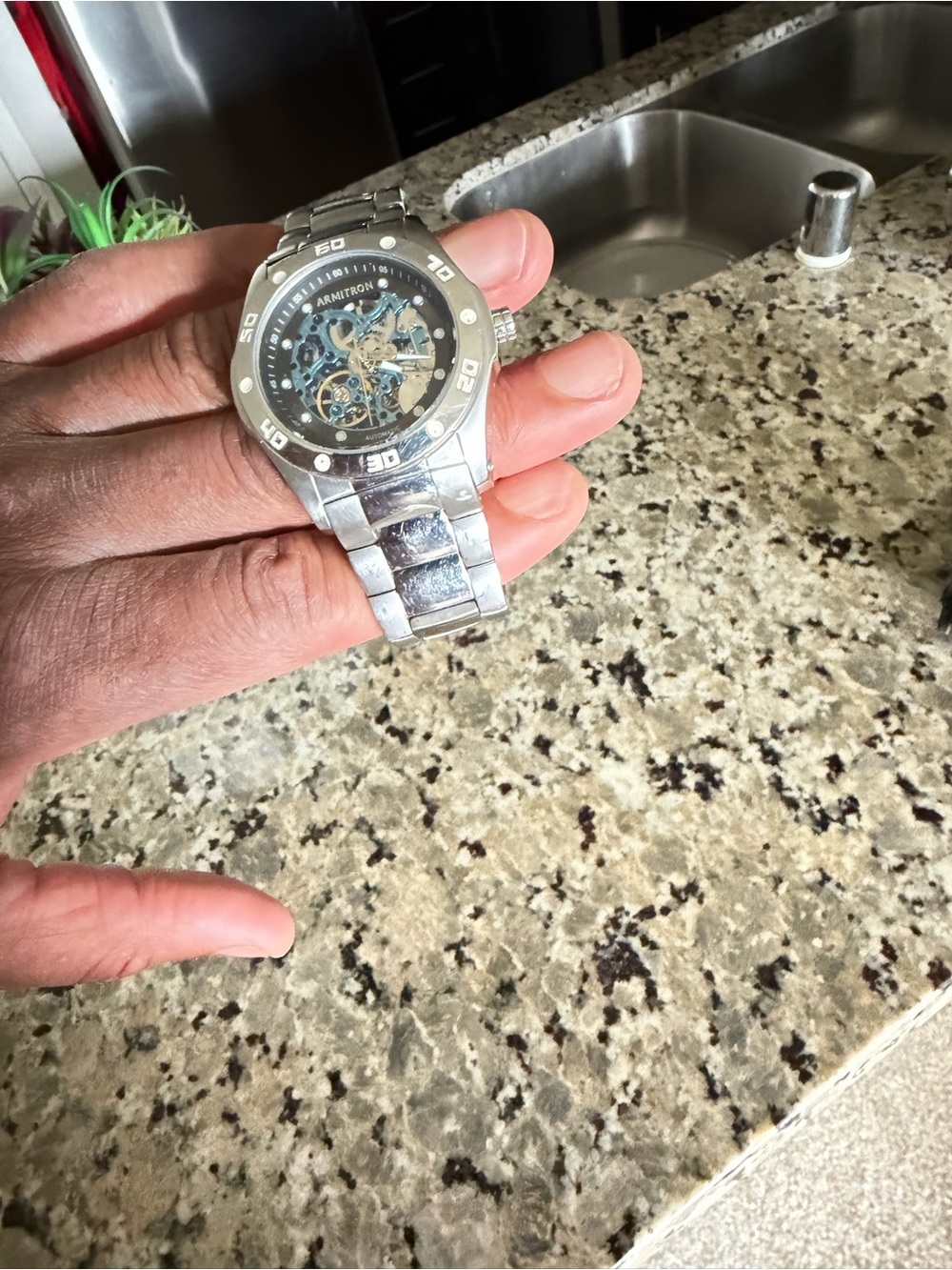 Armitron Silver Skeleton Dial Watch with Blue Accents